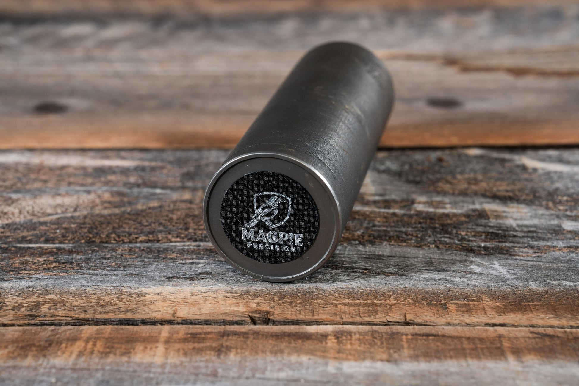 Close-up of a suppressor end cap fitted with a waterproof Magpie Suppressor Seal